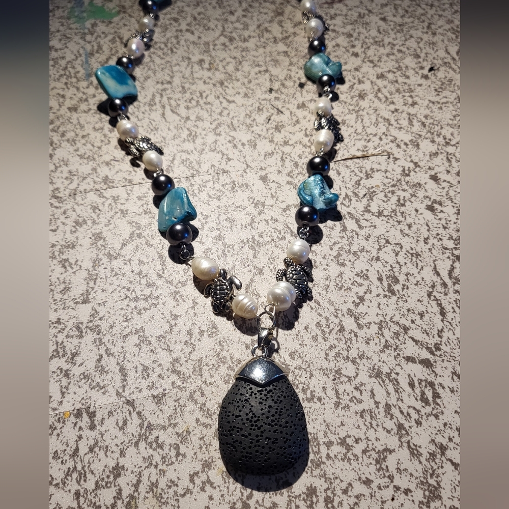 Elegant White and Blue Beaded Turtle Necklace